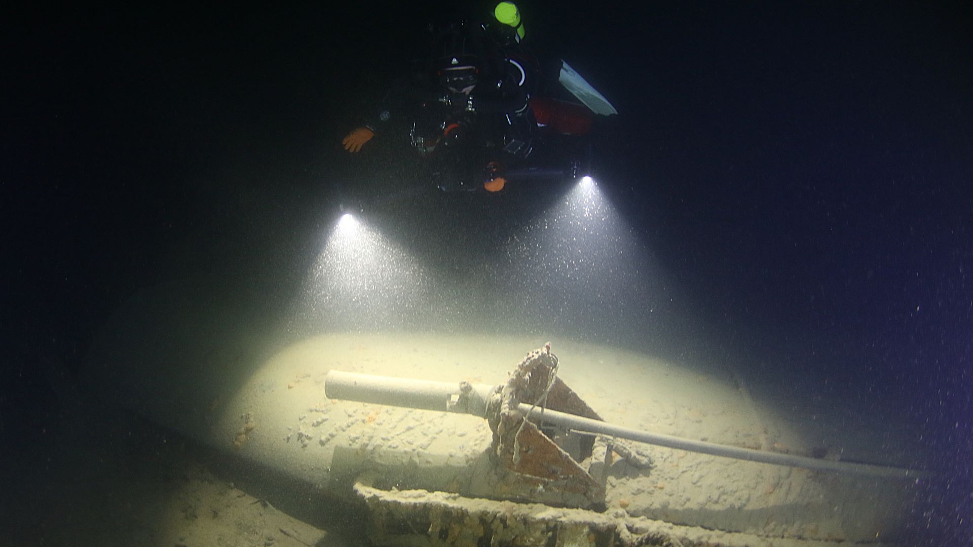 Divers preparing gear on a Great Lakes charter boat